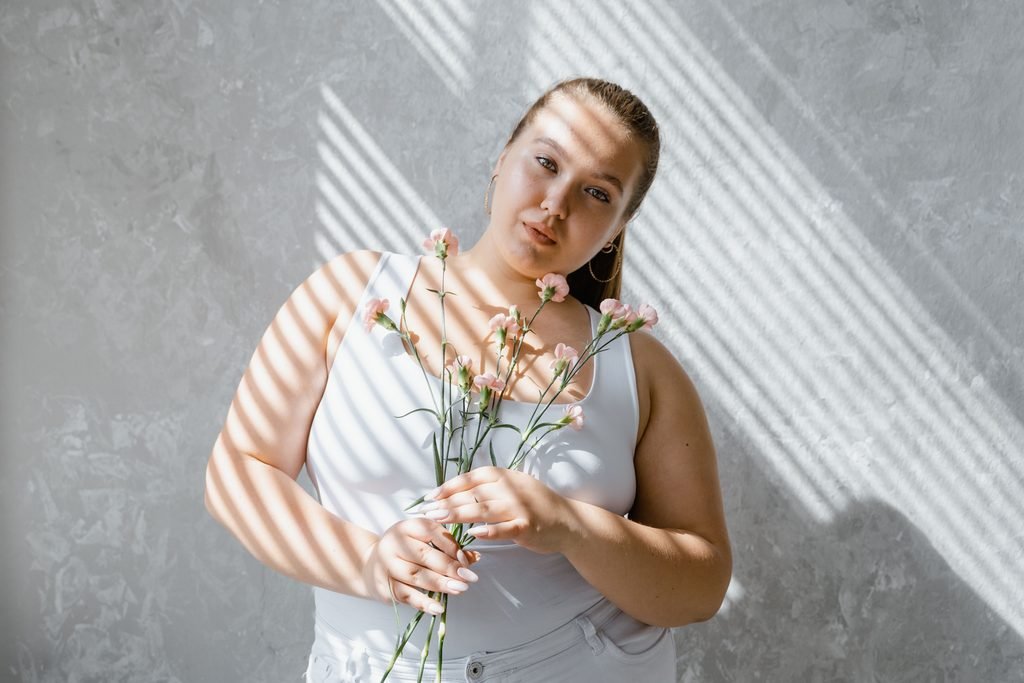 Confident plus-size woman wearing a polished modern outfit
